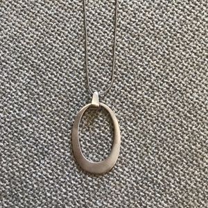 Minimalist brushed silver pendant on silver chain